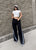 Pantalon negro rayas blancas